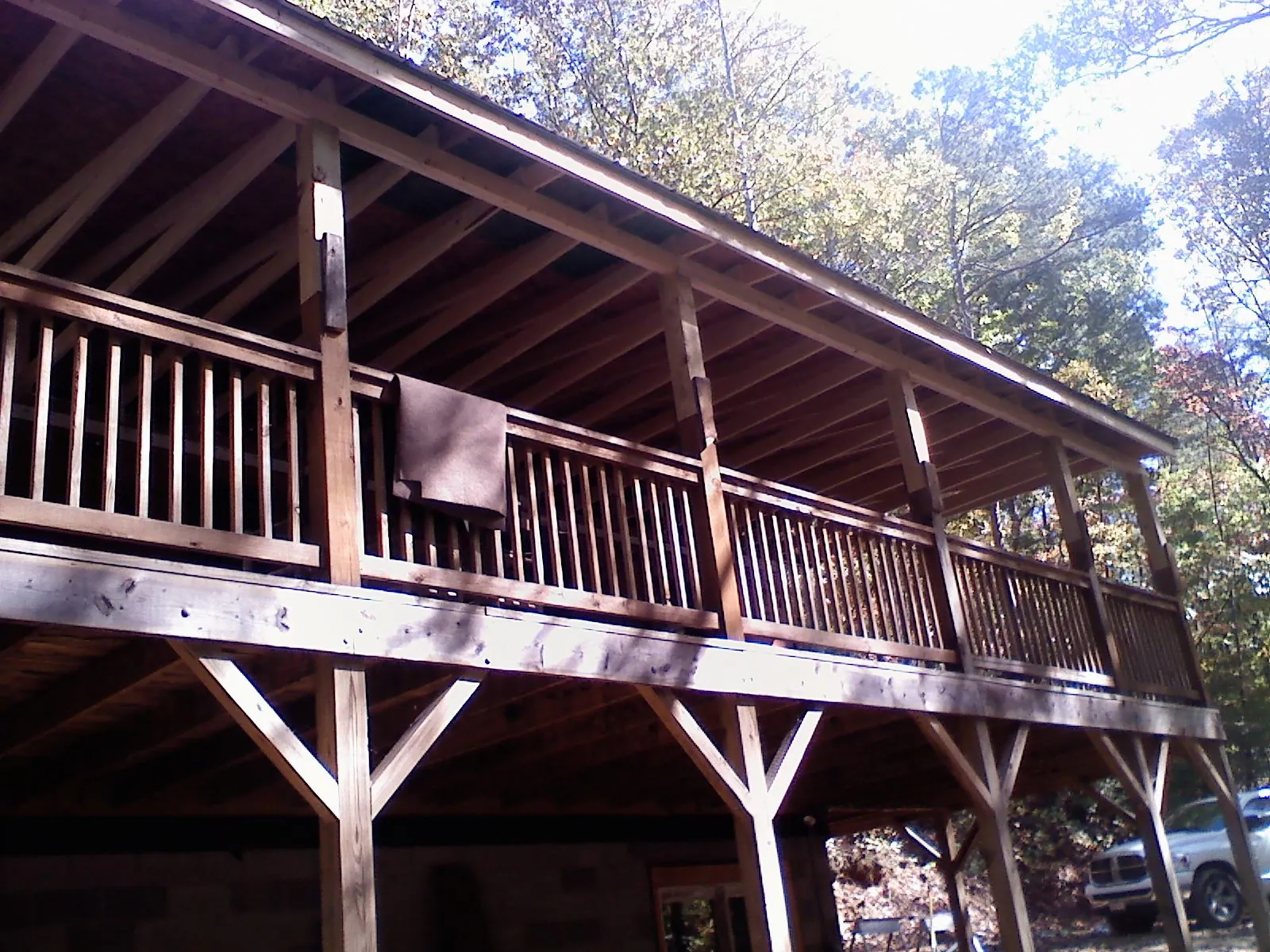 Timber framing under a new elevated porch and deck — Roof Leak Repair in Smithtown by Roofing Brothers